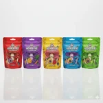 Higher Fire 4 gram mushroom gummy flavour lineup with five colourful pouches standing in a row