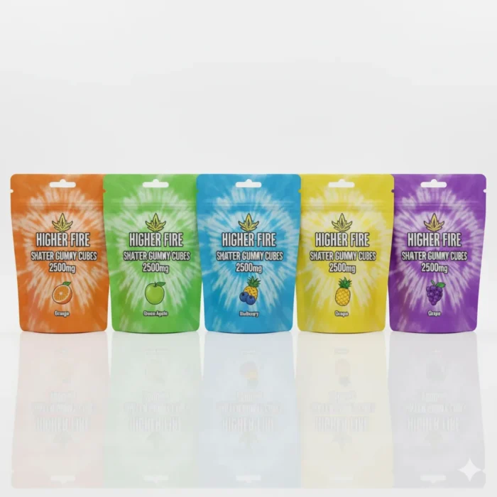 Higher Fire Shatter Gummy Cubes 2500mg flavour lineup with orange, green apple, blueberry, pineapple and grape pouches standing in a row