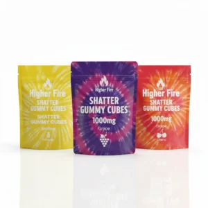 Higher Fire Shatter Gummy Cubes 1000mg flavour lineup with pineapple, grape and cherry pouches standing in a row